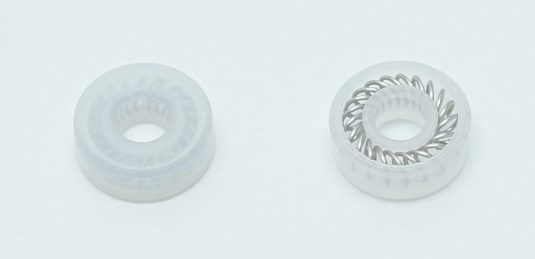 Secondary piston seal wash seal