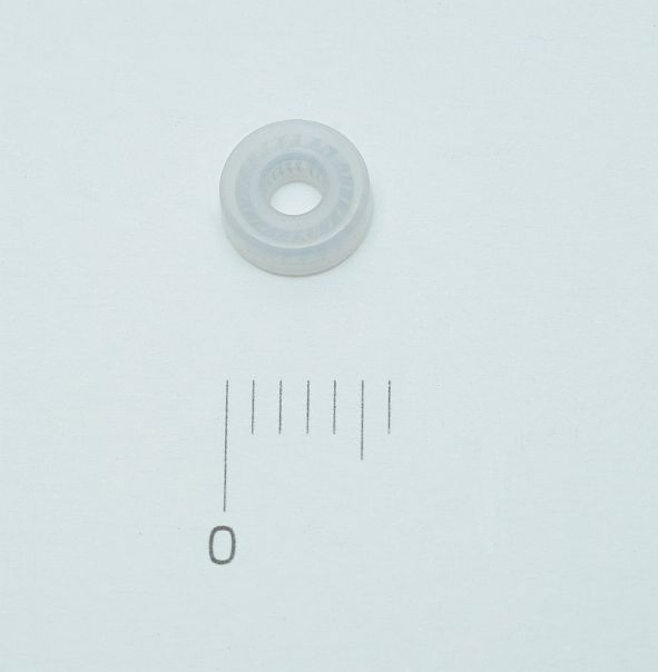 Secondary piston seal wash seal